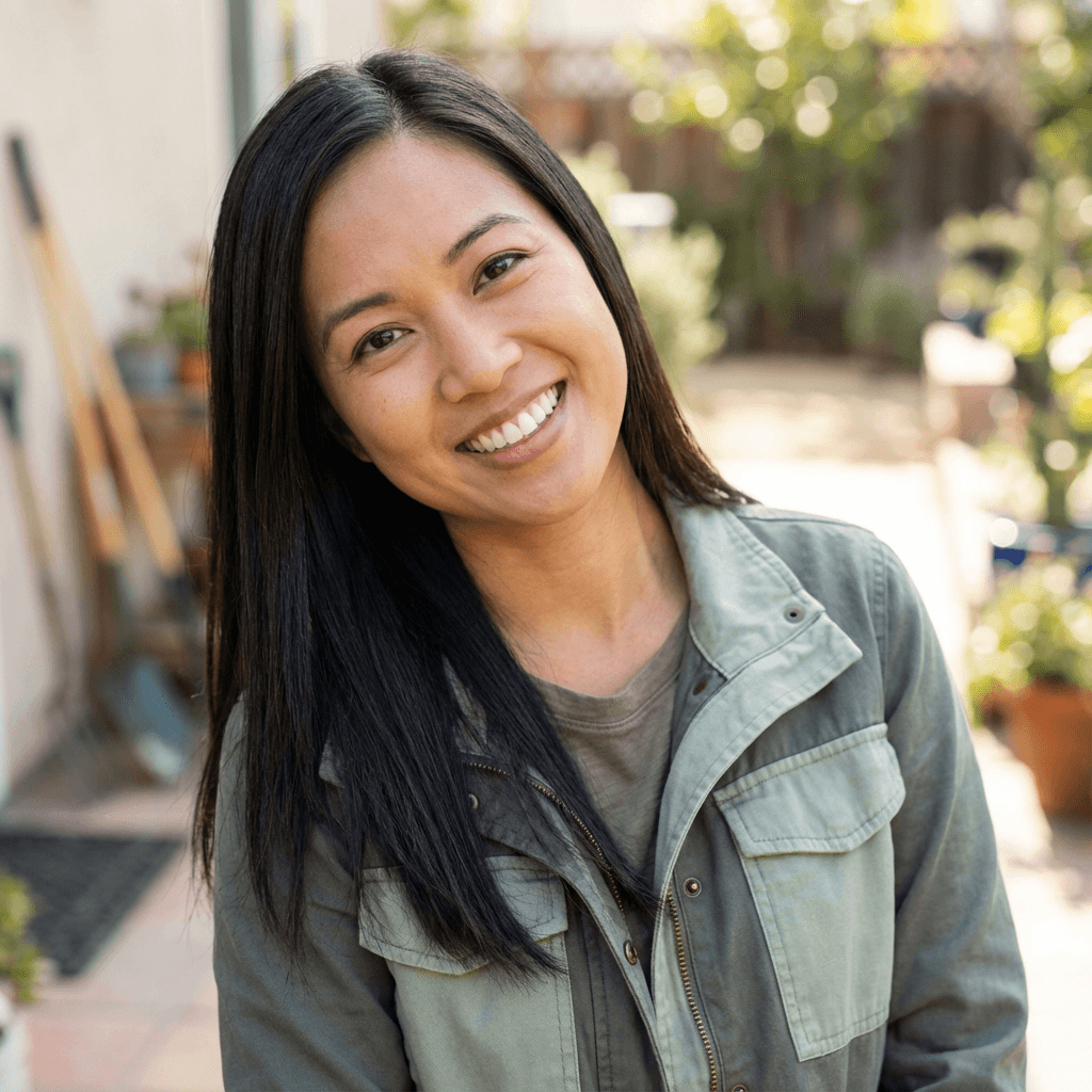 Lisa Nguyen smiling near a café counter